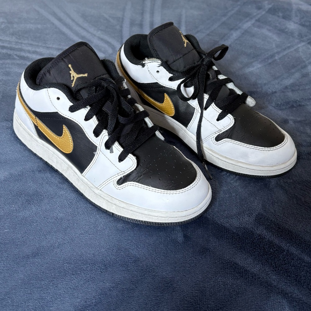 Jordan Black and Gold High-Top Sneakers